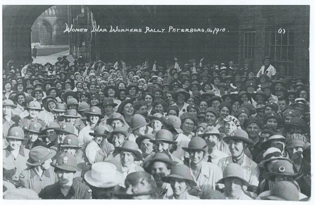 Land girls, foreground, face the camera, at Women War Workers Rally, Peterborough, 14 Sept 1918