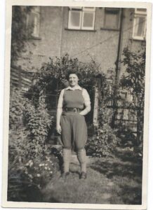 Betty in her Land Girl uniform in the garden of her family home in Peckham Rye in London, 1942 Source: Helen Van Dongen