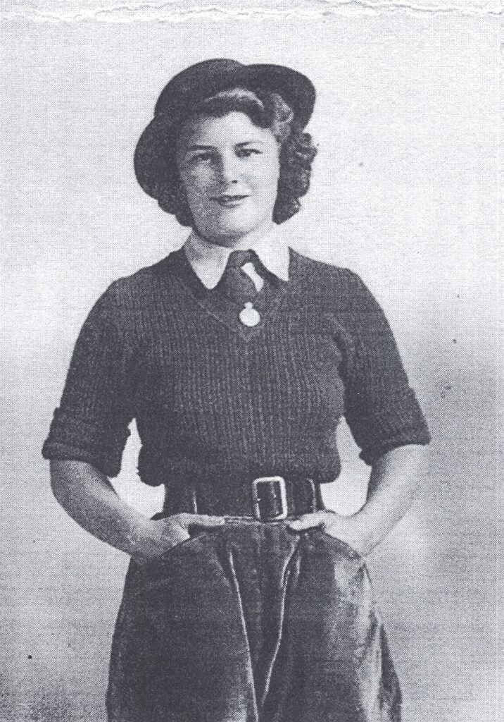 Zeita Trott, aged 17, in her new land girl uniform in the summer of 1942 when she joined the Women's Land Army [WLA] in Bedfordshire. She was based at Bolnhurst hostel in the north of the county and travelled out in mobile gangs each day to work on local farms. She left on medical grounds in 1945 after injury at work. She later married and became Mrs Holes.