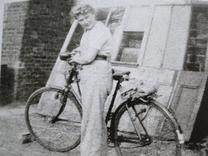 Land Girl on Bike Source: 