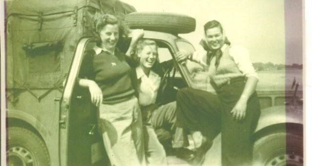 Betty Dugdale in Women's Land Army truck with friends