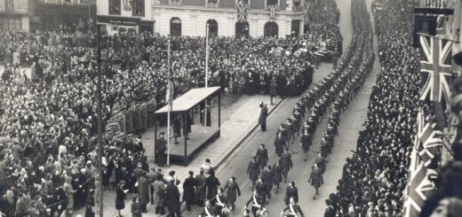 Bedfordshire land girls march past Princess Elizabeth down Bedford High Street on 14 February 1946 in a Victory parade