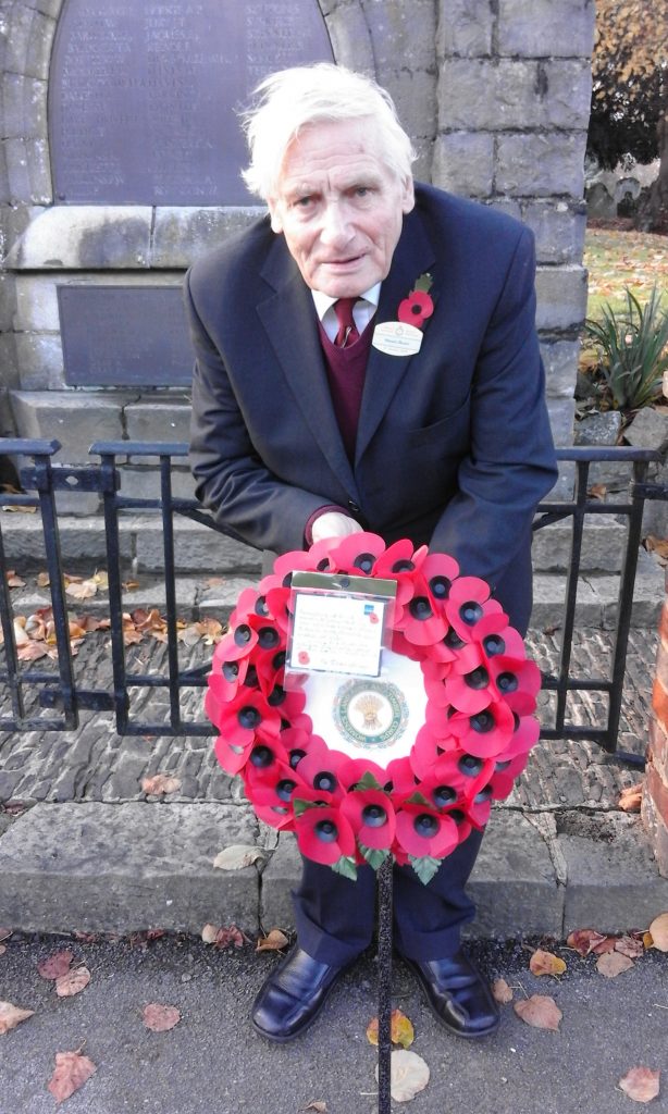 photo of Stuart with the wreath he laid at West Malling in Kent.  The photo was taken in front of the War Memorial just prior to the service.