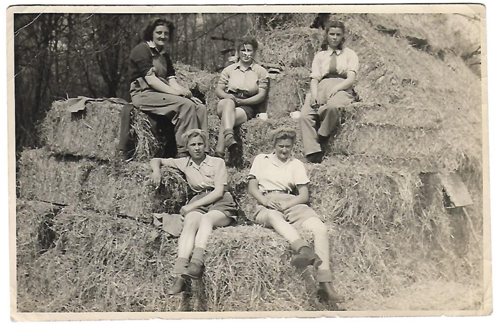 Joyce Charlton, Kitty Bland, Ena Smith, Sadie Brown, Joan Heaton working in the WLA in Buckinghamshire.