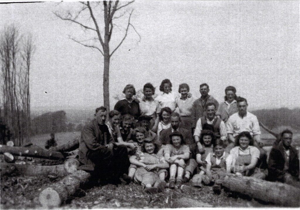 Women and men working in the forests.