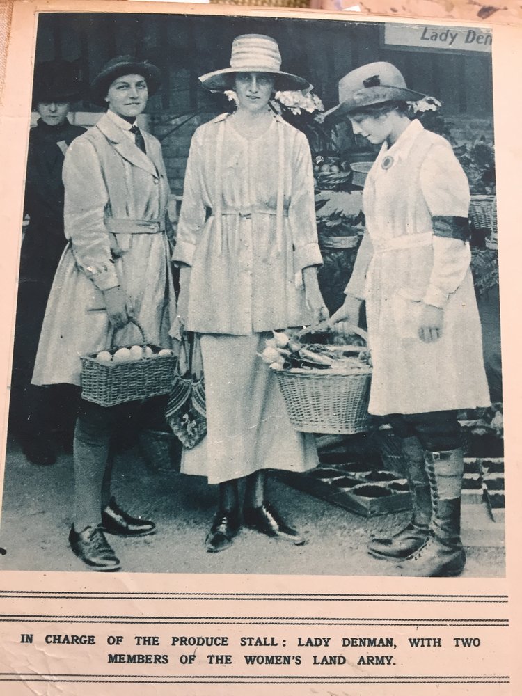 Lady Denman with two members of the Women's Land Army