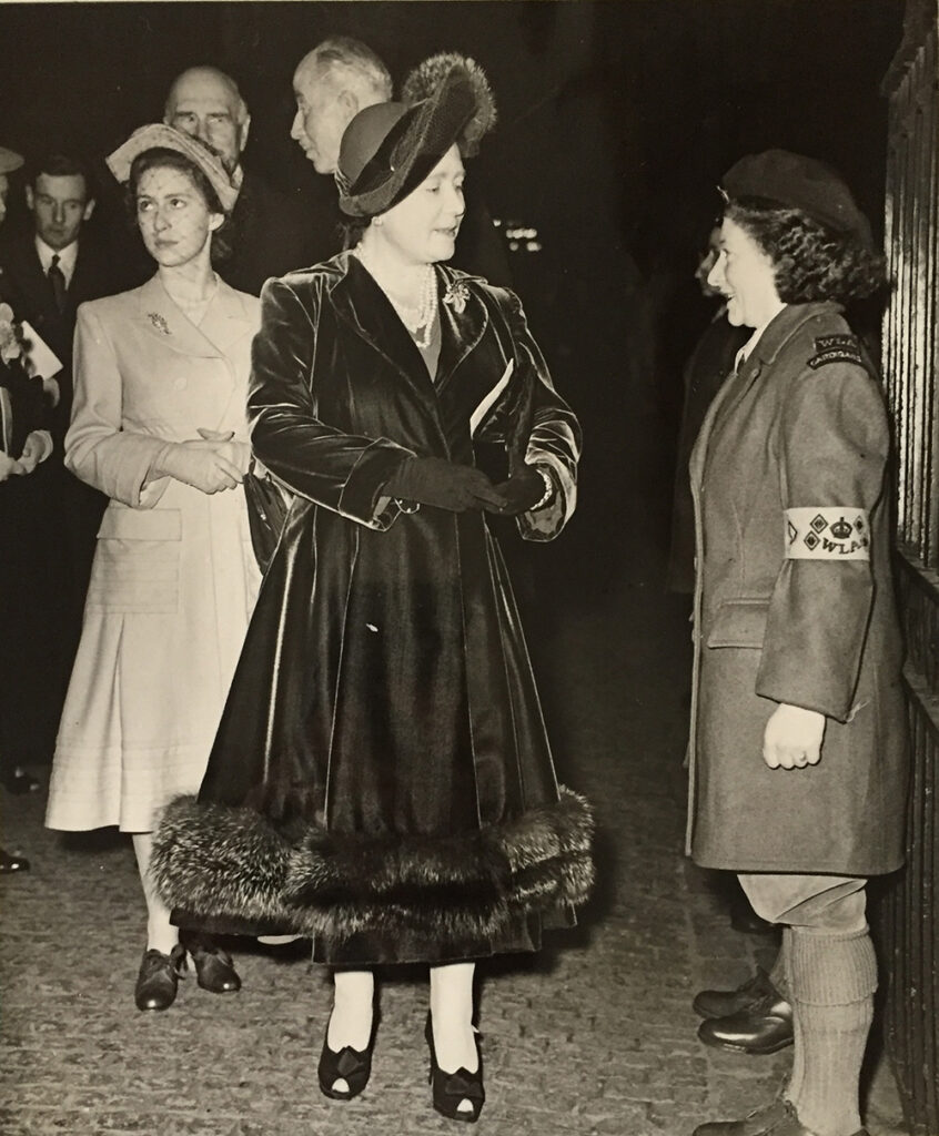 Queen talking to Land Girl at Harvest Festival in 1946