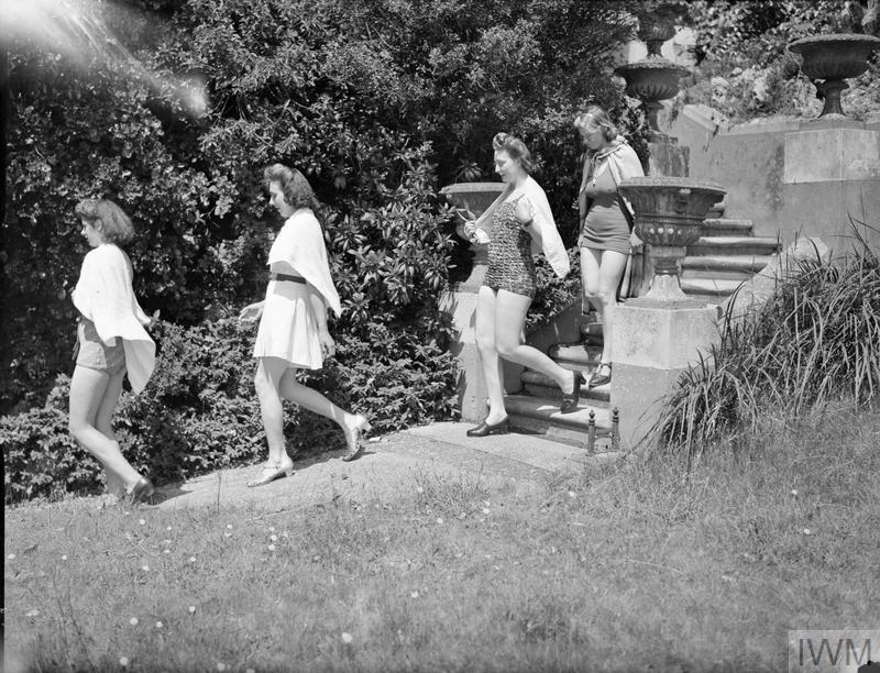 Land girls staying at St Elmo's WLA Rest House, Torquay, go swimming during their paid holiday.  Photo courtesy of the Imperial War Museum.