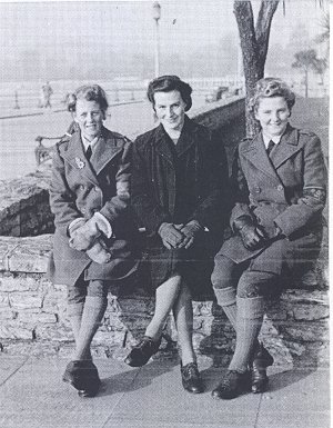 Three Land Girls on the winter seafront at Torquay during their stay at the WLA Rest House in December 1948. Mabel Bracey, on the left, was later to be one of the young women representing Bedfordshire WLA in the final disbandment parade at Buckingham Palace, on Saturday 21 October, before Queen Elizabeth, Patron of the WLA. Source: M Stratford. Courtesy of Stuart Antrobus