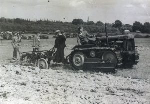 Katharine Ann Furley on a tractor.