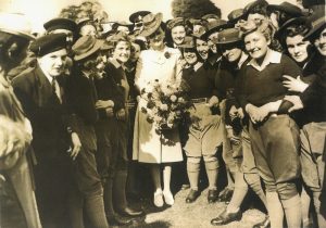 Princess Marina surrounded by Land Girls.