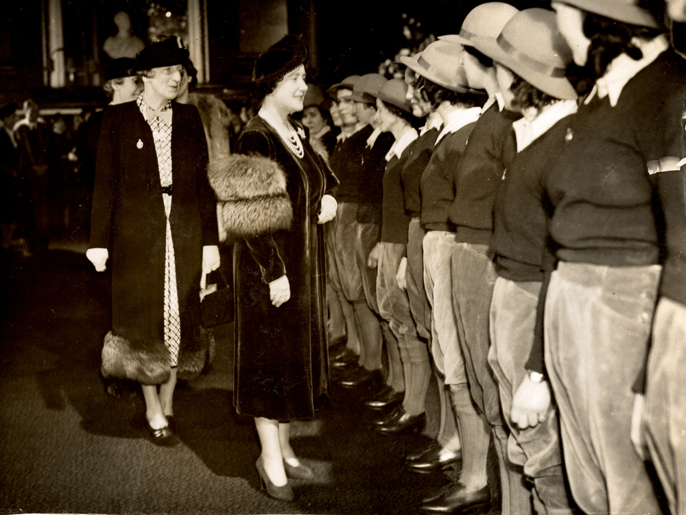 Queen Elizabeth, later Queen Mother, meeting Land Girls in March 1940 at Goldsmiths' Hall.